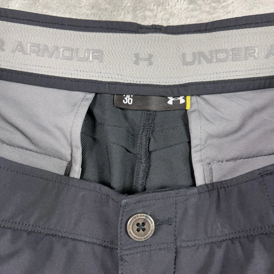Pantalones Cortos Under Armour Elastizados Frente Plano Para Hombres 36 Regular Negros Golf Informales Exterior Foto 3 de 4