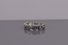 Sterling Silver 5.5mm Dimensional Carved Flow...