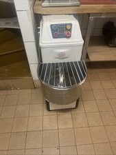 This professional spiral dough mixer features a fixed head and fixed bowl