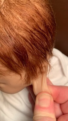He is around 14 inch ,silicone full body doll . Size Reborn?