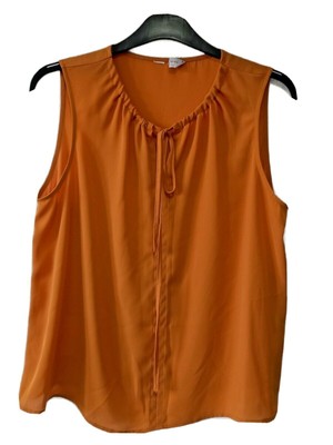 mustard yellow sleeveless top