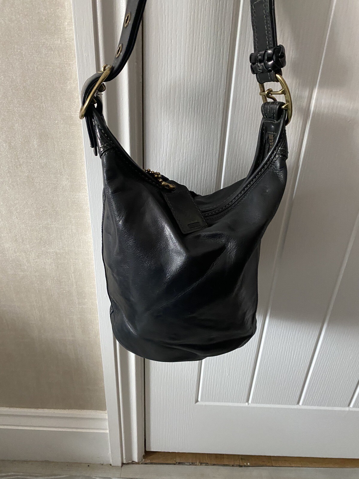 COACH Black Thick leather bucket / shoulder bag, brass buckles, from