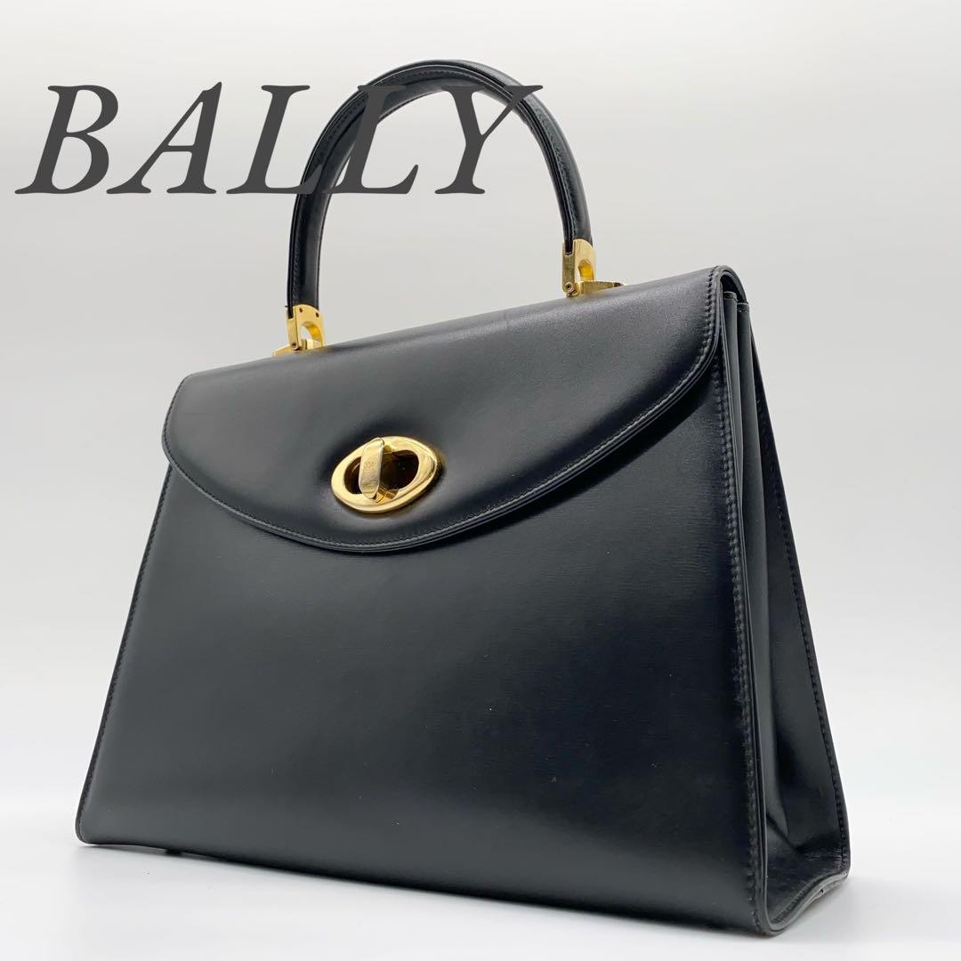 SAINT LAURENT Borsa Bally in buone condizioni formale Turnlock oro ferramenta nera