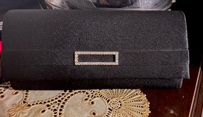 Elegante schwarze Clutch mit Strass-Dekoration