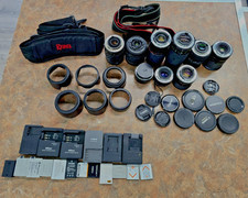 Mixed Lot Of Camera Lenses, Hoods And Lens Caps And More