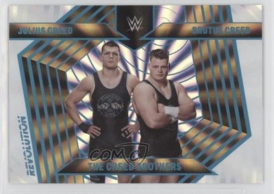 2023 Panini Revolution WWE Tag Teams Sunburst /99 Brutus Creed Julius Patch u0u