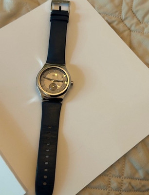 Swatch Automatic watch, swiss movement with blue leather band and skeleton back