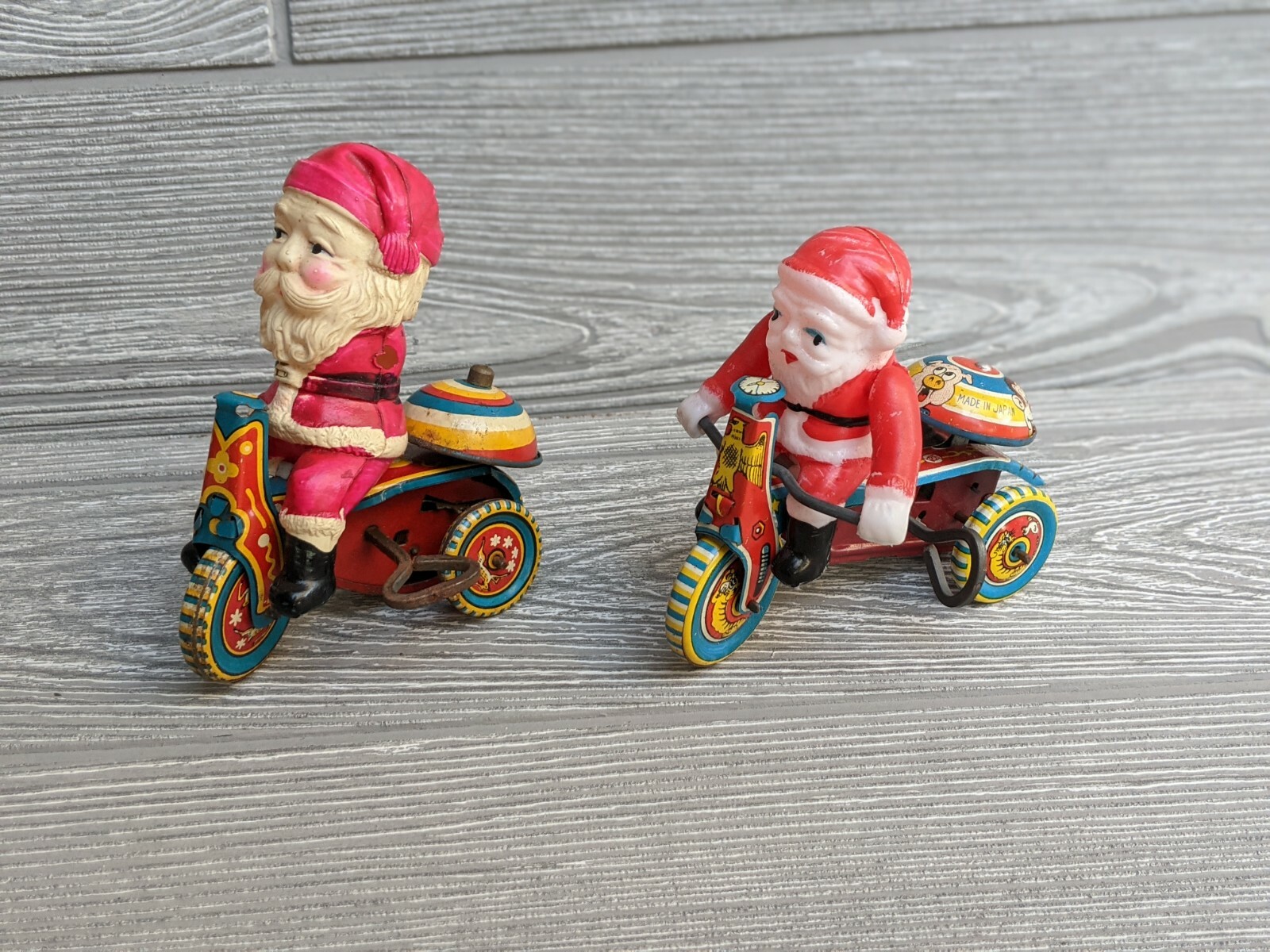 Lot 2 VINTAGE SANTA CLAUS CYCLE WIND UP TOY SUZUKI JAPAN T5-753  TIN- BLOW MOLD