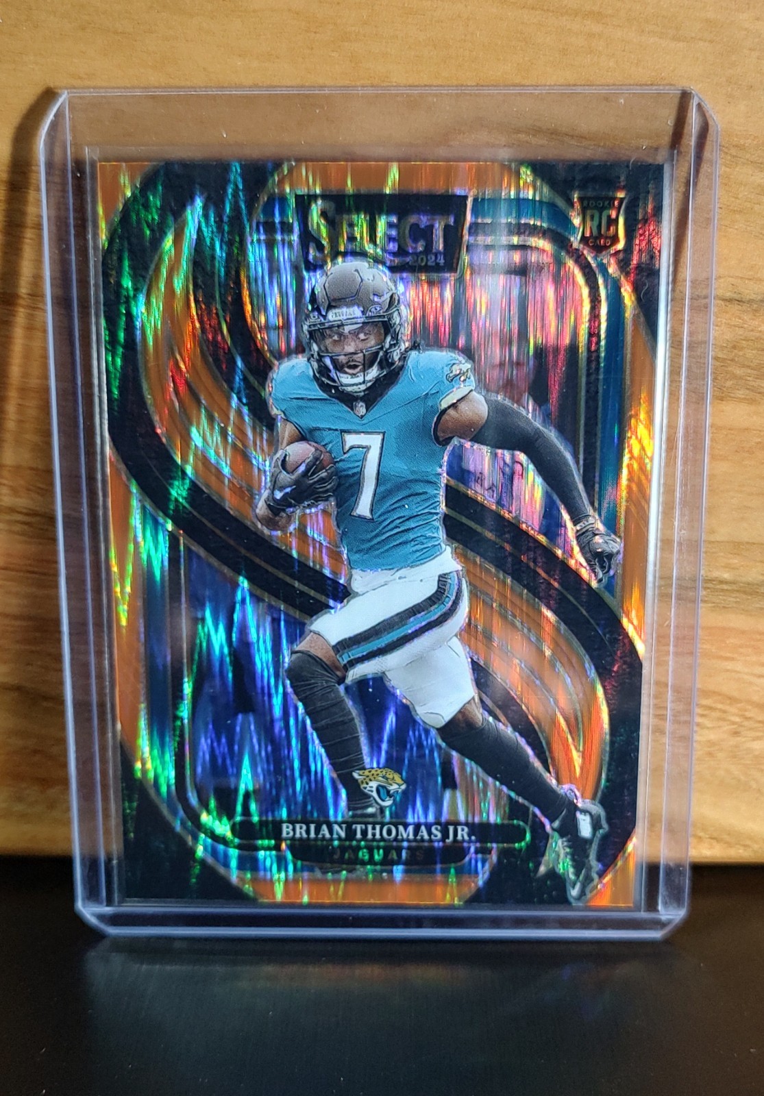 2024 Panini Select - Premier Level Brian Thomas Jr. #143 Orange Prizm /399 (RC)