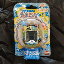 Ura Jinsei Enjoy Tamagotchi Plus JAL Yellow