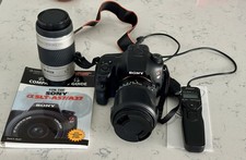 Sony alpha SLT-57 mirrorless digital camera with 2 lenses