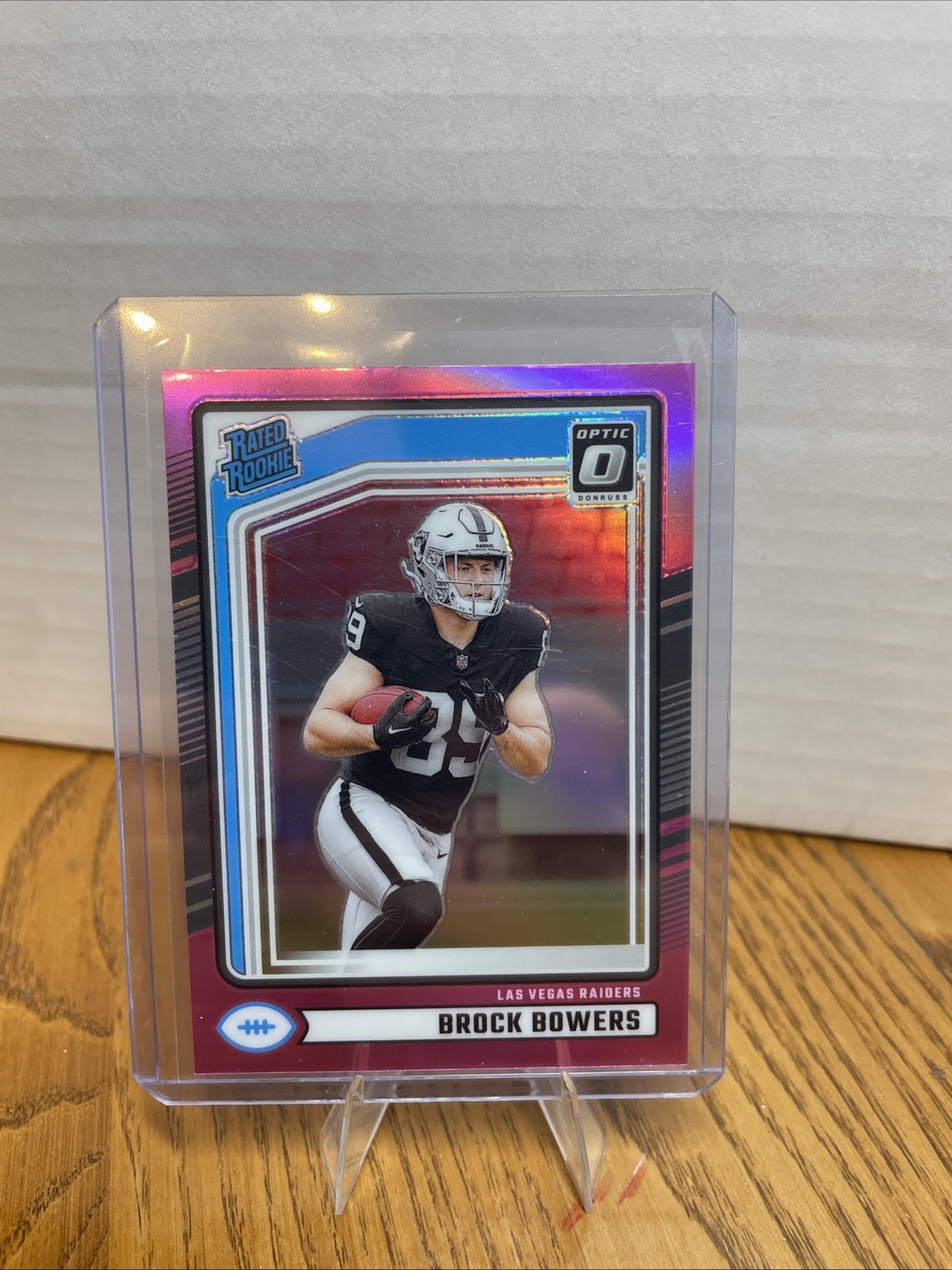 2024 Panini Donruss Rated Rookie Brock Bowers #394 Optic Preview Pink Prizm (RC)