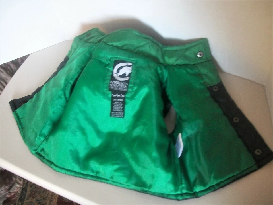 Chaleco aislante infantil verde negro broches de presión Rhino 9 meses Foto 3 de 4