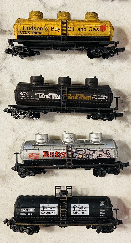 30 N scale train cars, 6 10 box, 9 tankers, 3 grain, 2