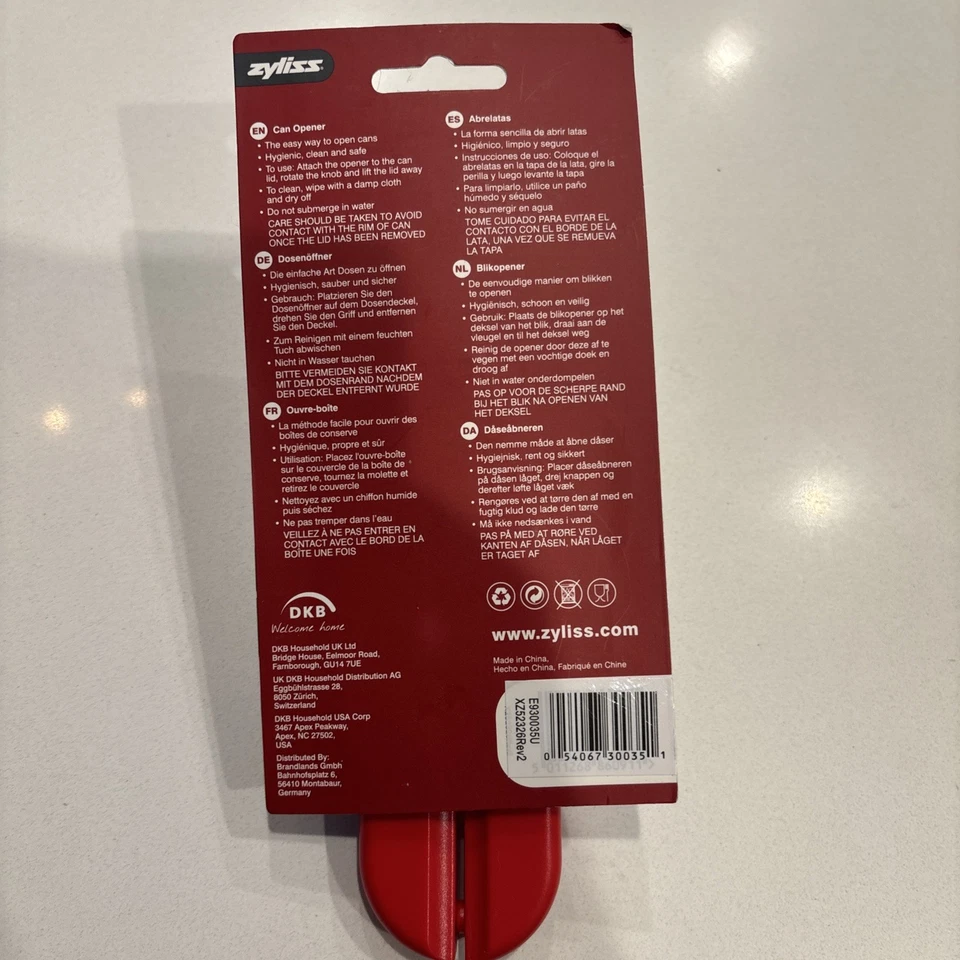 Abridor de latas manual Zyliss MagiCan con liberación de tapa - rojo Foto 2 de 3