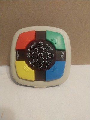 Vintage 1987 VTech Mini Wizard Simon Electronic Memory Handheld Game. Works