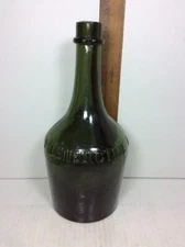 10.25" TALL OLIVE GREEN BENEDICTINE WINE BOTTLE W/ CROSSES & HORSESHOE 1880s ERA