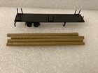 N Scale Flatbed Stake Trailer W/4 Loose Logs 13442-CC4315-126 — photo 6