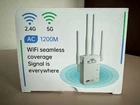 AC 1200Mbps WiFi Extender – Dual Band 2.4G/5G Signal Booster with Ethernet Ports