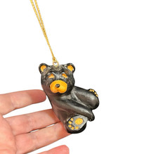 Big Sky Carvers Bear foots by Jeff Fleming Retired Christmas Ornament 3"