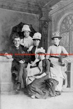 F014170 Man Wearing a Suit Women Wears Long Dresses and Hats Douglas Head Isle o