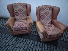 A pair of Tetrad Eastwood Wingback Tan Leather & Fabric Kilim Armchairs chairs