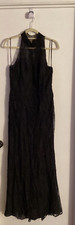 Women "Badgley Mischke" halter style, sleeveless black gown. Size 14 P.O.