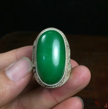 Antique store collects old silver inlaid green jade rings