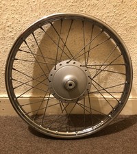 Roue avant Suzuki AP 50 17 pouces origine OEM années 70 encore avec graisse d’origine