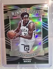 2023-24 Panini Donruss Optic - Winner Stays Jrue Holiday #9 Holo Prizm