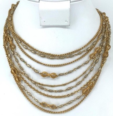 Vintage Kramer Faux Pearl Gold Tone Multi Strand Bib Necklace Bow Swirl Clasp