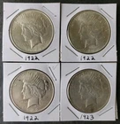 Three 1922 and One 1923 $1 Peace Silver Dollars