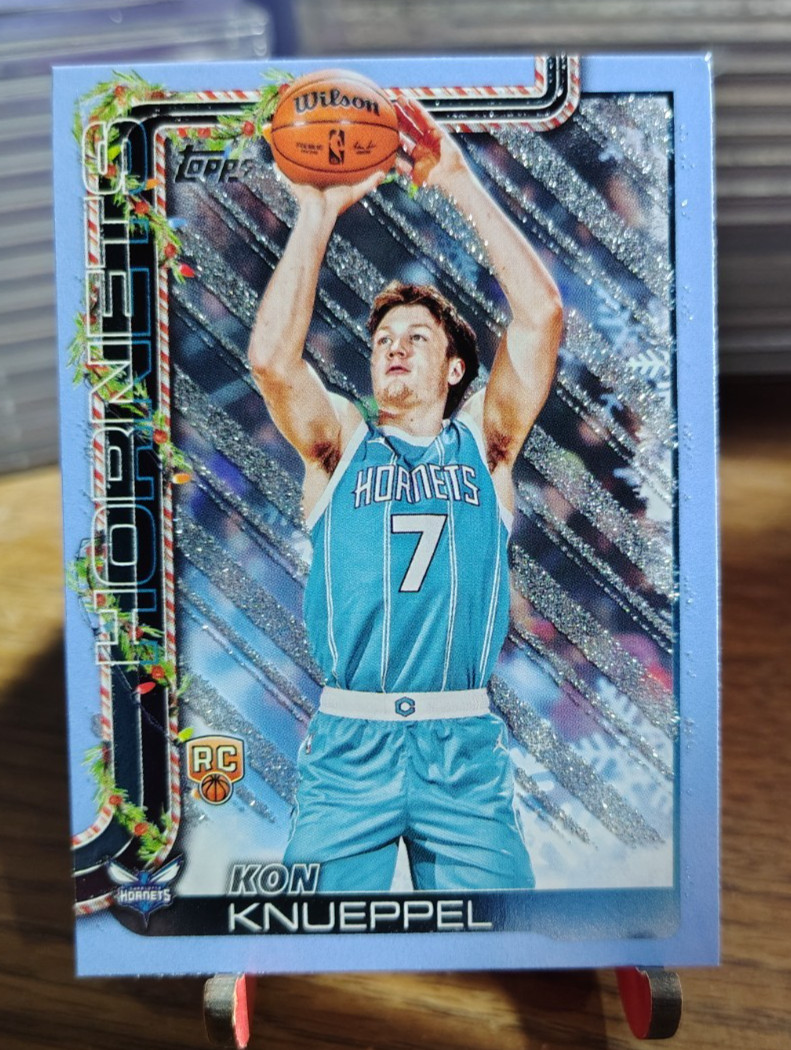 2025-26 Topps Holiday Kon Knueppel RC Light Blue & White Glitter #H164 Hornets