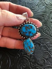 Blue Cloud Mountain Turquoise Chocolate Web Pendant 2" Rivet Design Bezel