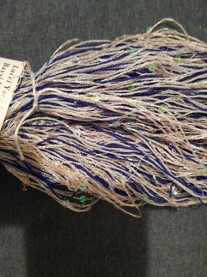 Tiene lentejuelas. Hilo de cinta de lujo Lucci. Color Is azul iris y melocotón transparente Foto 2 de 4