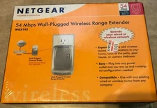 Netgear 54 Mbps Wireless Powerline Access Point Range Extender WGX102 Wall Plug 