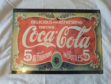 Drink Coca-Cola At Fountains In Bottles Metal Sign