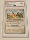 2025 POKEMON PRE EN-PRISMATIC EVOLUTIONS POKEMON DAY 2025 #074 EEVEE PSA 10