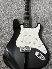 Squire Bullet Strat In Black And White With Professional Set Up