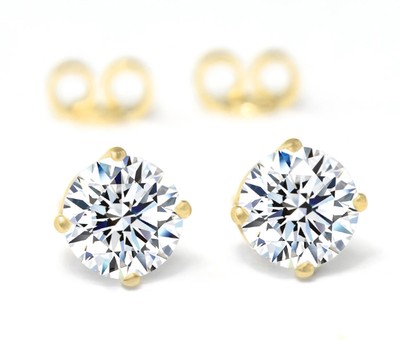 Brilliant solitaire stud in 585 gold with 3.16ct; VVS2 & F; with IGI certificate!