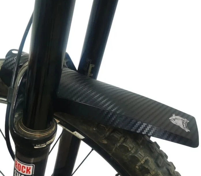 Mudguard downhill outlet