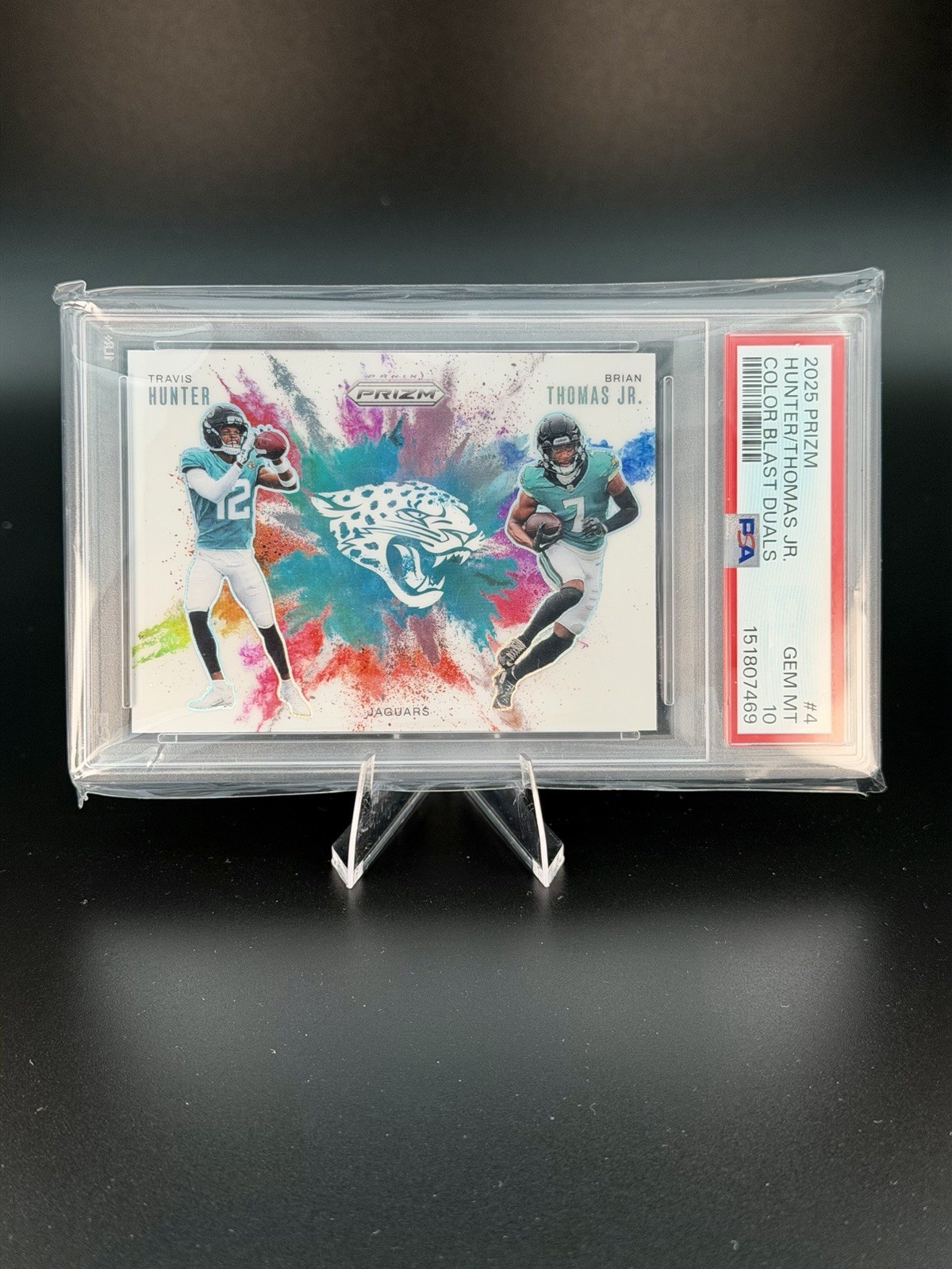 Brian Thomas Jr. / Travis Hunter #4 Football Cards 2025 Panini Prizm Color Blast Dual trading card — raw and PSA graded price guide