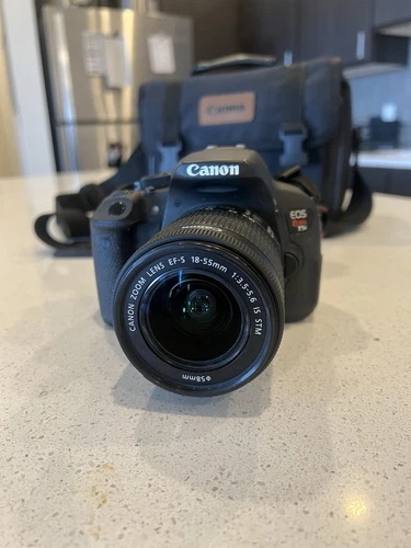 Canon EOS Rebel T5i DSLR w/EF 18-55mm f3.5-5.6 STM, Battery, charger, Case