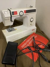 Elna 1010 Mechanical Sewing Machine With Foot Pedal And Instructions