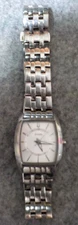 BULOVA Unisex Tank Watch C877634 Silver Rounded Rectangular Silver Dial H2O Resi