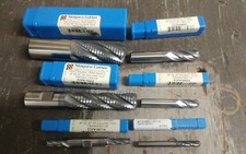 numerous sizes of end mills at least a quantity of 12 for each size shown