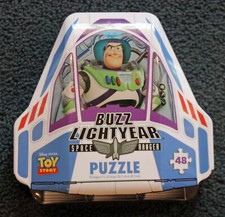 Toy Story 48 piece Puzzle with Buzz Lightyear Rocket Ship Collector Tin!