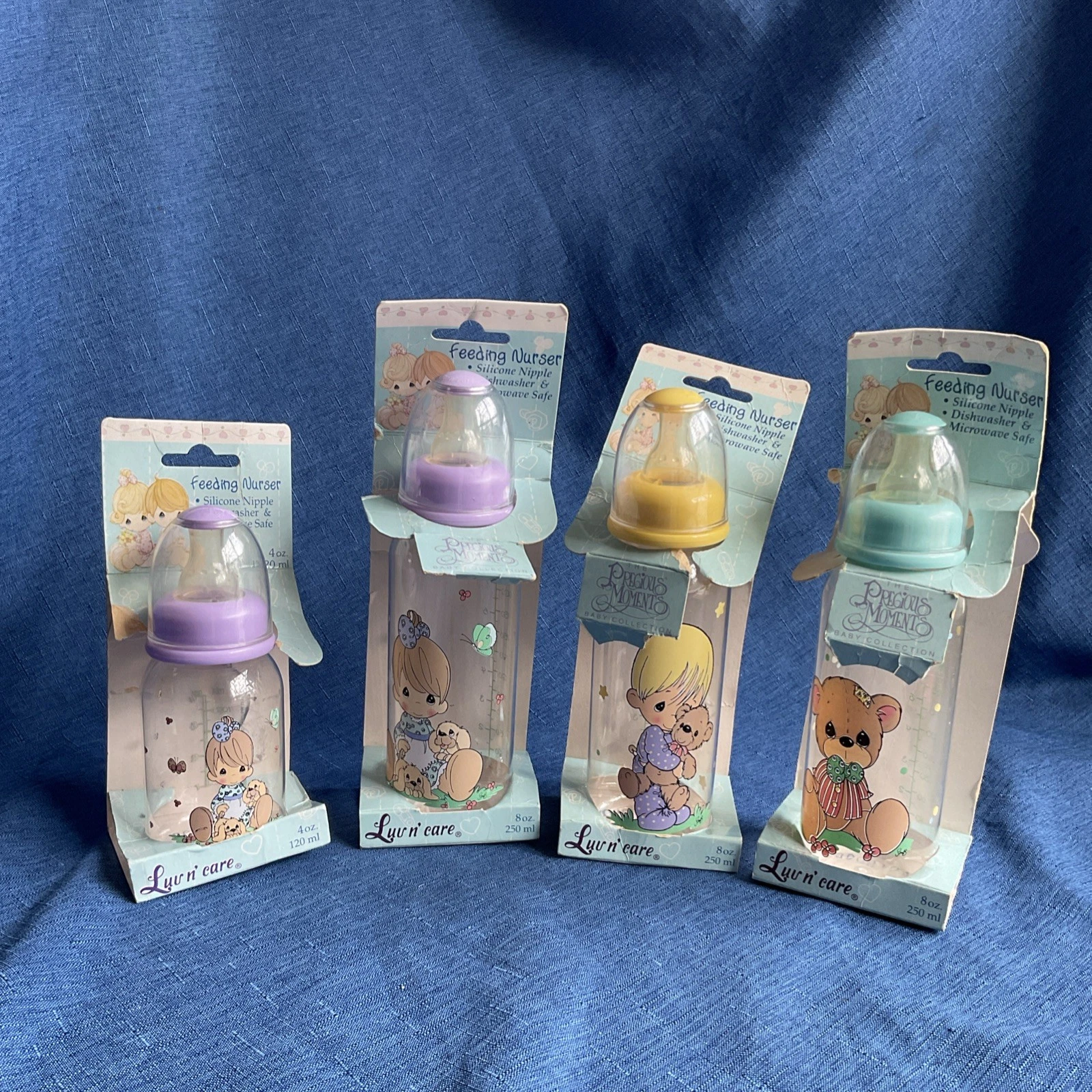 Precious Moments 4 Baby Bottles three 8oz Clear one 4 oz inv#114
Opens in a new window or tab