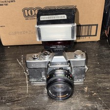 Appareil photo reflex argentique 35 mm Minolta SRT MC-II avec objectif 50 mm f/1,7 et flash AF en argent