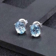 2Ct Oval Cut Lab Created Aquamarine Women's Stud Earrings 14K White Gold Plated